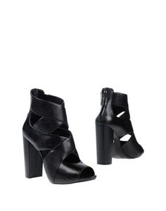Полусапоги и высокие ботинки Guess