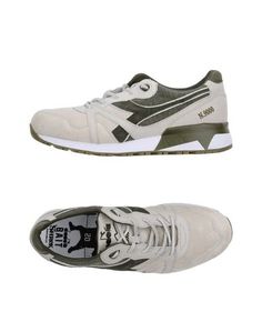 Низкие кеды и кроссовки Diadora