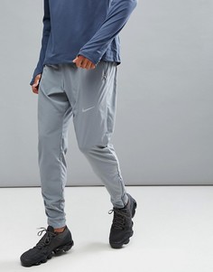 Серые тканые брюки Nike Running Flex 885280-065 - Серый