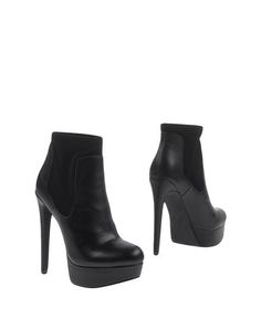 Полусапоги и высокие ботинки Steve Madden