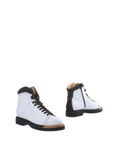Полусапоги и высокие ботинки Santoni