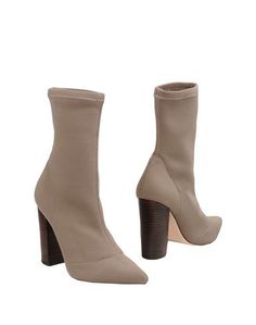 Полусапоги и высокие ботинки Steve Madden