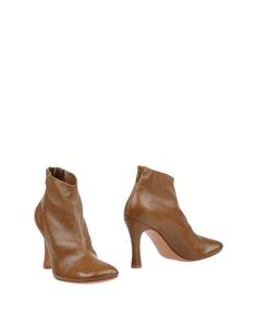 Полусапоги и высокие ботинки CÉline