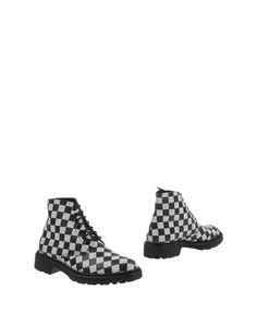Полусапоги и высокие ботинки Saint Laurent