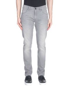 Джинсовые брюки Wrangler