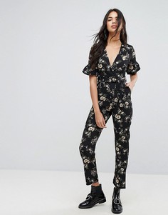 Комбинезон с цветочным принтом PrettyLittleThing - Черный