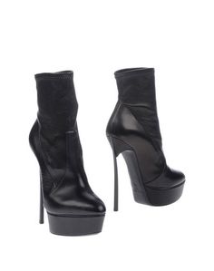 Полусапоги и высокие ботинки Casadei