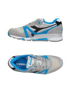 Низкие кеды и кроссовки Diadora