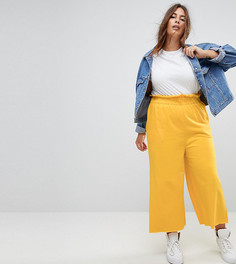 Джоггеры с широкими штанинами ASOS CURVE - Желтый