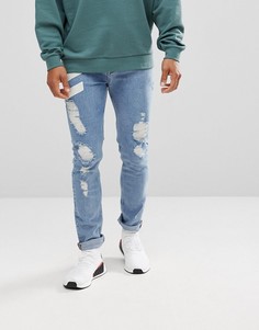 Выбеленные рваные джинсы скинни с шевронным принтом ASOS - Синий