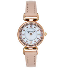 Часы округлой формы с кожаным браслетом Anne Klein