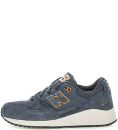 Замшевые кроссовки с выделкой под рептилию New Balance