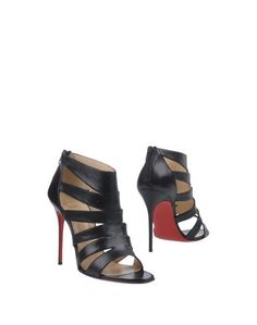 Полусапоги и высокие ботинки Christian Louboutin