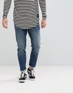 Темные суженные книзу джинсы ASOS - Синий