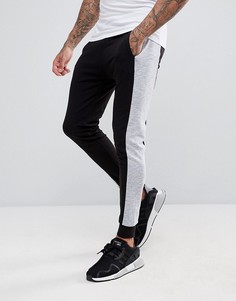 Супероблегающие джоггеры с контрастными вставками ASOS - Черный