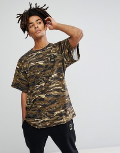 Зеленая футболка с камуфляжным принтом Puma x XO 57535151 - Зеленый