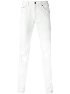 джинсы кроя слим с рваными деталями Saint Laurent