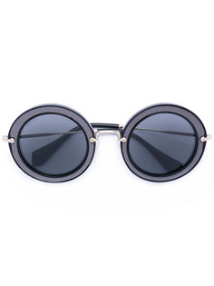 круглые солнцезащитные очки в массивной оправе Miu Miu Eyewear