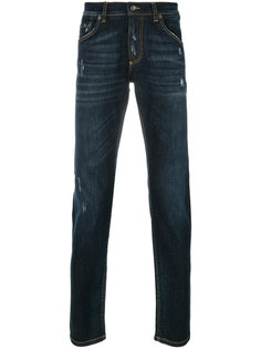 джинсы с протертыми деталями Dolce & Gabbana