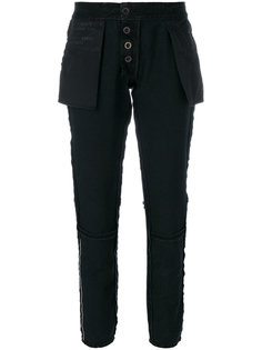 вывернутые наизнанку зауженные брюки Unravel Project