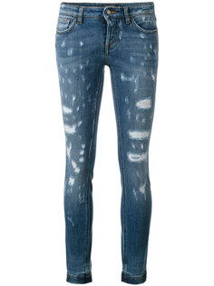джинсы скинни с рваными деталями Dolce &amp; Gabbana