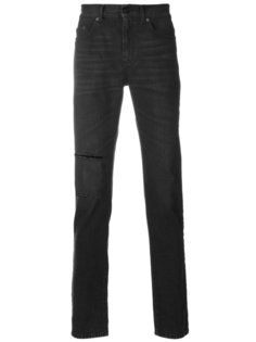 джинсы с рваными деталями Saint Laurent