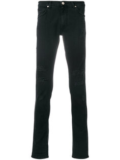 джинсы с рваной отделкой  Versace Jeans