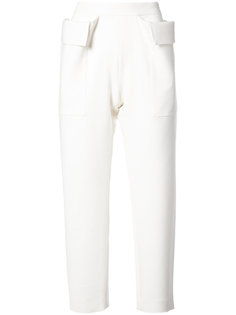 trousers with statement pockets Maison Rabih Kayrouz