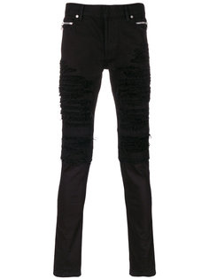 рваные джинсы в байкерском стиле Balmain