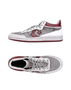 Низкие кеды и кроссовки Converse Limited Edition