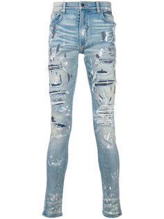джинсы кроя слим с рваными деталями Amiri
