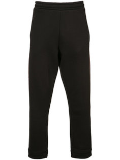 спортивные брюки с красной полоской 032C