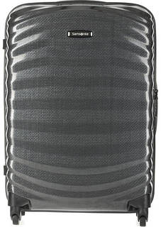 Серый пластиковый чемодан на колесах Samsonite