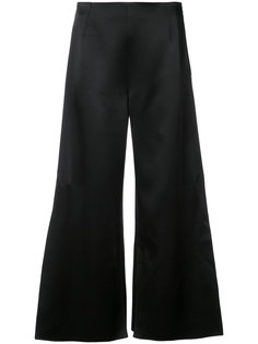 расклешенные строгие брюки  Roland Mouret