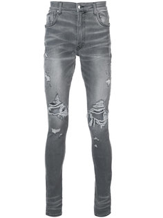 состаренные джинсы скинни  Amiri