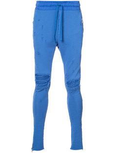 состаренные спортивные брюки  Amiri