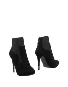 Полусапоги и высокие ботинки Guess