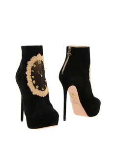 Полусапоги и высокие ботинки Charlotte Olympia