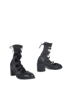 Полусапоги и высокие ботинки Guidi