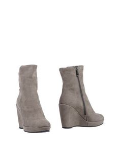 Полусапоги и высокие ботинки Ikaros