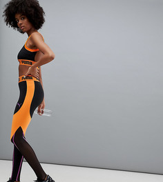 Черно-оранжевые леггинсы Puma эксклюзивно для Asos - Оранжевый