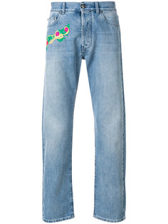 джинсы с вышивкой Versace