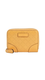 What Goes Around Comes Around Gucci Yellow Diamante Zip Wallet (Previously Owned)