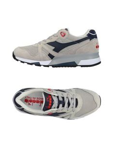 Низкие кеды и кроссовки Diadora