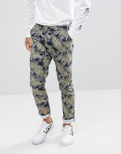 Брюки скинни с пальмовым принтом в винтажном стиле ASOS - Красный