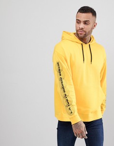 Худи оверсайз с принтом на рукавах ASOS - Желтый