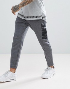 Серые суженные книзу джоггеры Nike Hybrid 885947-071 - Серый