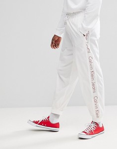 Джоггеры с фирменной полосой Calvin Klein Jeans - Белый