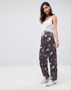 Брюки с широкими штанинами и цветочным принтом ASOS - Розовый