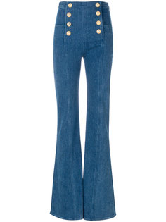 расклешенные джинсы с декоративными пуговицами Balmain